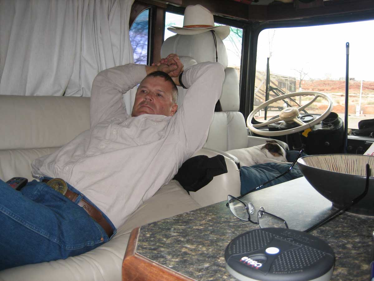Lee and his little mutt chilling out in our old MCI Bus