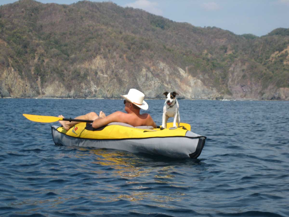 Lee and his little mutt leisurely kayaking in Mexico